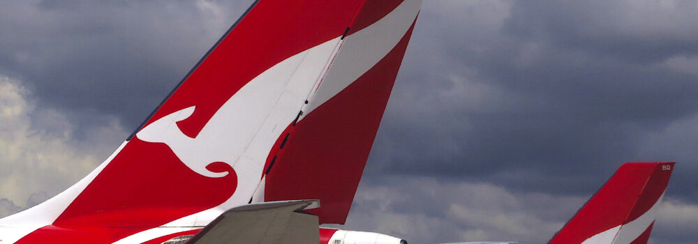 FILE PHOTO: Two Qantas Airways Airbus A330 aircraft can be seen on the tarmac near the domestic terminal at Sydney Airport in Australia, November 30, 2017.      REUTERS/David Gray