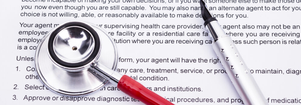 Image shows an advanced directive, a stethoscope and a pencil